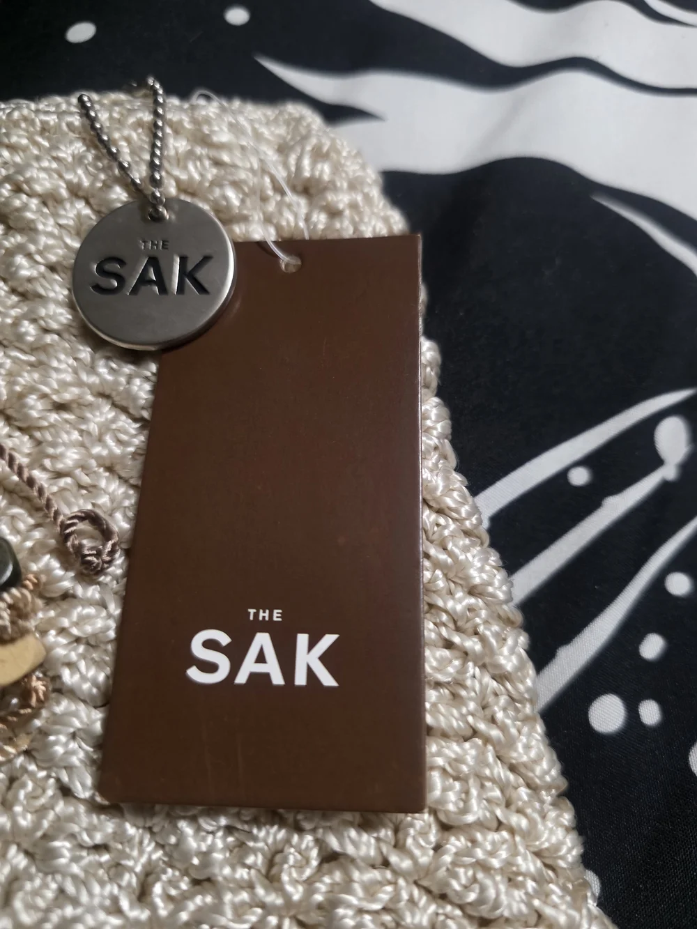 The SAK Beige Crochet Tote Bag with Brown Handles